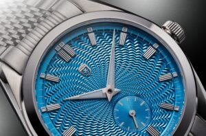 HEINRICH Radiance Guilloche turquoise blue Dial Close-up - Courtesy of HEINRICH